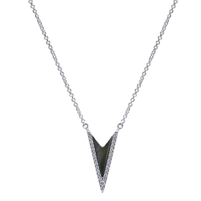 This funky black mother of pearl and round diamond necklace has plenty of attitude to go along with its sparkle,m featured in 14k white gold.
