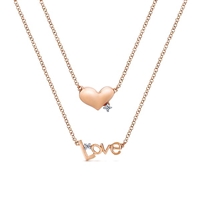 This 14k rose gold heart and love necklace features diamond accents.