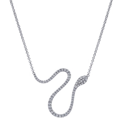 This charming white gold diamond snake with round diamonds is a clever and stylish addition to any wardrobe in 14k white gold.