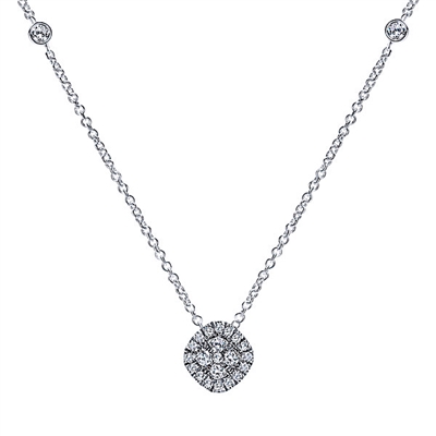 A beautiful diamond cluster featuring nearly one third carats of shimmer is attached to a 14k white gold link chain with diamond accent tags.