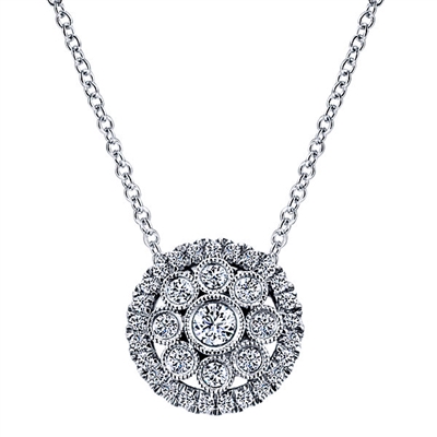 This sunburst style necklace is filled with one half carats of round brilliant diamonds is surrounded by a radiant diamond halo that puts this whole piece together!