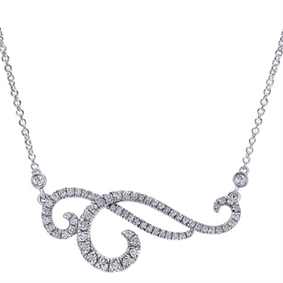 This 18k white gold diamond swirl necklace is packed with almost one half carat of round brilliant diamonds, giving this lux diamond necklace its shine.