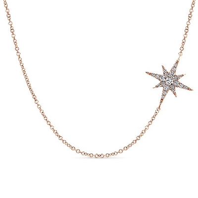 A star pendant hangs from 14k rose gold in this shimmering diamond necklace.