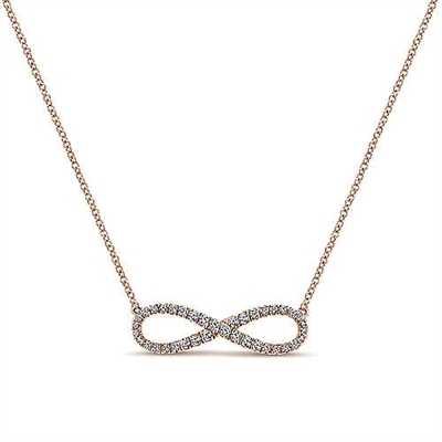 A 14k rose gold diamond infinity necklace with 0.42 carats of round brilliant diamonds.