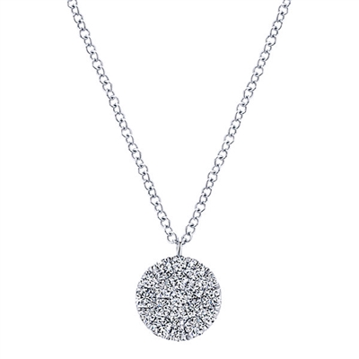 A beautiful diamond disc necklace hangs gracefully from a sturdy ink chain in this dynamic 14k white gold diamond necklace.