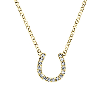 This diamond horseshoe necklace features shimmering diamond accents in the familiar and comforting equestrian symbol done in 14k yellow gold.