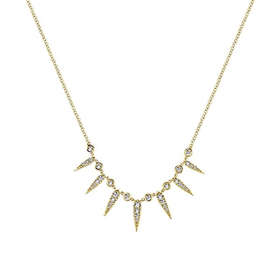 Glistening in 14k yellow gold. this diamond drop necklace features one third carats of diamonds.