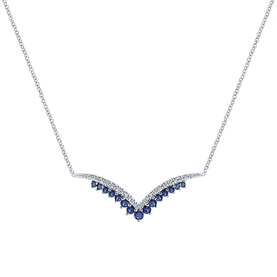 This sapphire and diamond necklace features an intricate design and a classic style in 14k white gold.