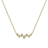 Diamonds hang in this 14k yellow gold bar necklace.