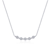 This graceful bar necklace is curved in 14k white gold.