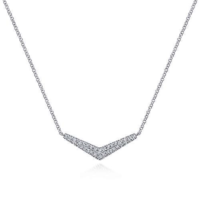 This 14k white gold diamond bar necklace in a chevron pattern features one quarter carats of diamonds.