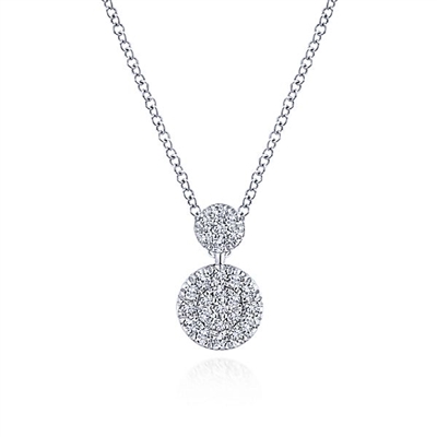 This 14k white gold diamond necklace showcases two diamond disc sections.