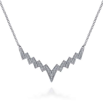 This 14k white gold zigzag bar showcases 0.30 carats of diamond shine.