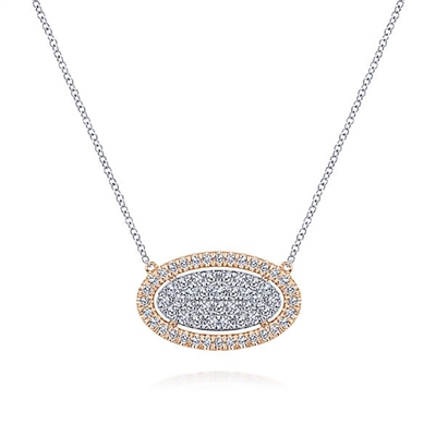 This 14k white and rose gold diamond necklace features 1 carat of diamonds.