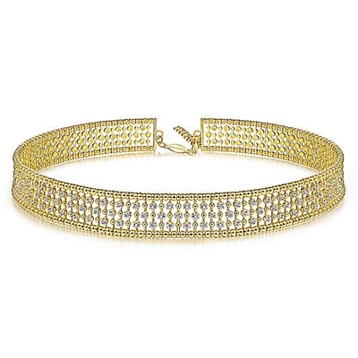 This 14k yellow gold diamond choker necklace features diamonds studded around 14k yellow gold that wrap sweetly around your neck.