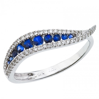 This 14k white gold sapphire and diamond wave ring features 0.16 carats of diamonds with 2 mm sapphires.