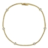This 14k yellow gold diamond tennis bracelet features 1.25 carats of round brilliant diamonds that shimmer and glisten against the smooth yellow gold.