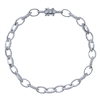 Alternating diamond links connect in this 14k white gold diamond tennis bracelet.