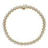 Round brilliant diamonds shimmer from within 14k yellow gold rope bezels in this diamond tennis bracelet.