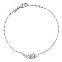 This diamond feather bracelet is a delicate and dazzling accessory in 14k white gold!