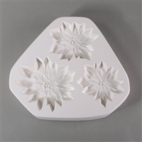 A triangular white ceramic mold for fusing hot glass on a grey background. Three flat detailed poinsettia flowers have been carved into it. Each flower is a slightly different size, with the bottom left being the largest and the bottom right the smallest.