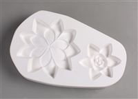 An oval-shaped white ceramic mold for fusing hot glass on a grey background. Two detailed flat succulents have been carved into it. The left succulent is larger with a simpler center, but both have pointed petals.