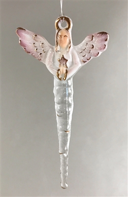 A fused glass angel ornament hanging in front of a gray background. The angel is mostly white with gold accents on the halo, hair, sleeves, and wings. The body tapers into a clear icicle shape. The wings also have a bit of mauve at the edges.