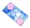 A rectangular tray made from marbled blue and white glass. The two opposing diagonal corners have each been decorated with a pink glass hibiscus flower with a yellow center and a few thin green-blue leaves to either side.