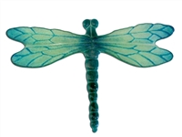 A large, fused glass dragonfly on a white background. It is primarily a dark teal color with lighter iridescent details surrounding the veins on the wings.