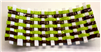 Strips of white, brown, and lime green fused glass that have been shaped and woven together then slumped into a rectangular tray shape.