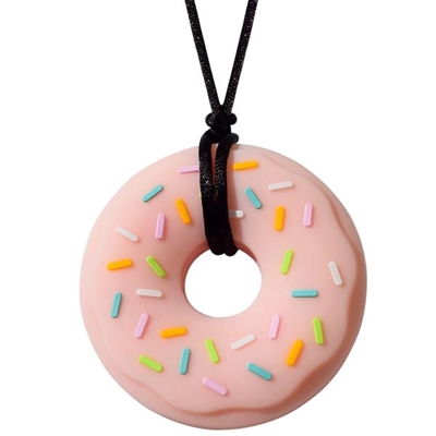 Got Special KIDS|The Munchables Donut Chew Necklace is our firmest design. It features a slightly textured front side that has raised sprinkles on it and a smooth reverse side.