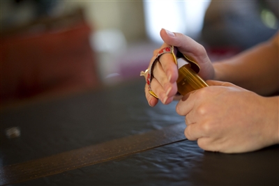 Mini-GRIP, use as a water bottle opener