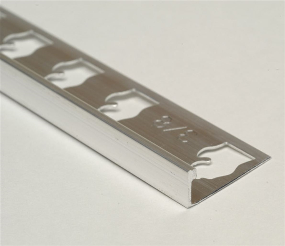 L Channel Transitional Trim 1/4 " Suwanee Atlanta GA Johns Creek Georgia Schluter-Jolly Edge Trim 5/16in. in Polished Chrome Anodized Aluminum Mill