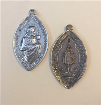 St. Norbert, Patron of Safe Childbirth. 1-3/4 - Catholic religious medals in authentic antique and vintage styles with amazing detail. Large collection of heirloom pieces made by hand in California, US. Available in sterling silver and true bronze.