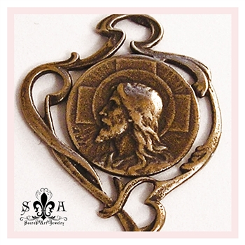 Jesus Profile Art Nouveau Medal 1 1/4" - Catholic religious medals in authentic antique and vintage styles with amazing detail. Large collection of heirloom pieces made by hand in California, US. Available in sterling silver and true bronze