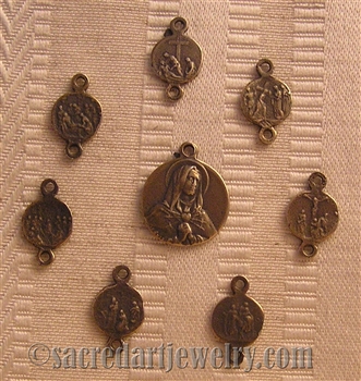 Seven Sorrows Medal Set 5/8"  - Catholic religious medals in authentic antique and vintage styles with amazing detail. Large collection of heirloom pieces made by hand in California, US. Available in sterling silver and true bronze