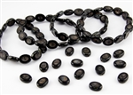 10.5x13.5mm Carved Oval Flower Czech Glass Beads - Jet Black Picasso