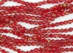 6mm Firepolish Czech Glass Beads - Transparent Siam Ruby Marbled Gold