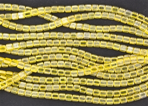 CzechMates 6mm Tiles Czech Glass Beads - Lemon Yellow Star Dust T152