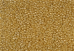 11/0 Takumi Toho Japanese Seed Beads - Golden Cream Lined Crystal Luster #983