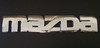Chrome Mazda Emblem