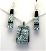 Hawaii fused glass jewelry.  Handmade on Maui. Pendant and Earrings. Silver sparkle on black glass.