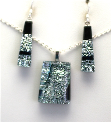Hawaii fused glass jewelry.  Handmade on Maui. Pendant and Earrings. Silver sparkle on black glass.