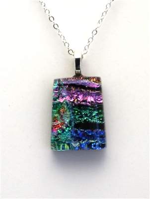 Dichroic glass pendant. Purple, pink and ocean sparkle with rainbow highlights.