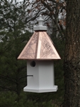 Our Cottage Bird House is lovely hanging from a tree. The copper roof adds to the beauty. Will patina over time