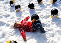 photo of kids playing with fake snow