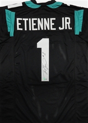 TRAVIS ETIENNE JR. SIGNED CUSTOM REPLICA JAGUARS JERSEY - BAS