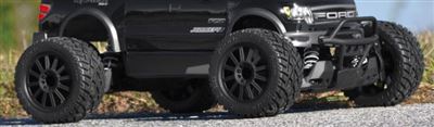 J Concepts Rustler Front G-Locs 2.8" Tires On Black Rims (2)