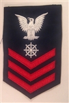 USCG Petty Officer First Class Rating Badge with Specialty:  QUARTERMASTER (QM) - E6 - Red on Blue Serge