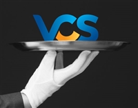 VCS Intelligent Workforce Management logo on a silver plate being held by a hand in a white glove